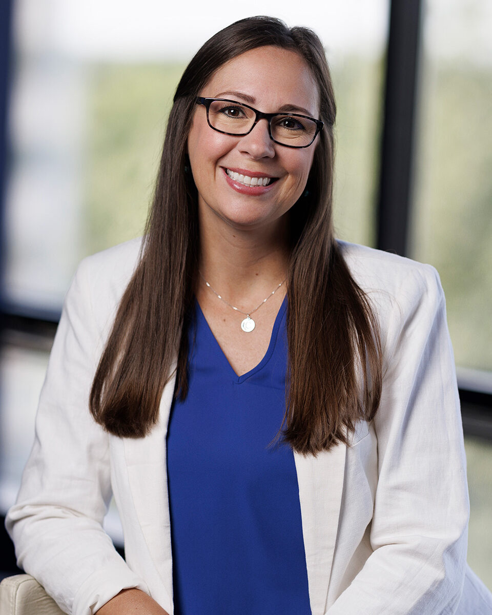 Portrait of Carli Whittlesey, SVP, Client Service